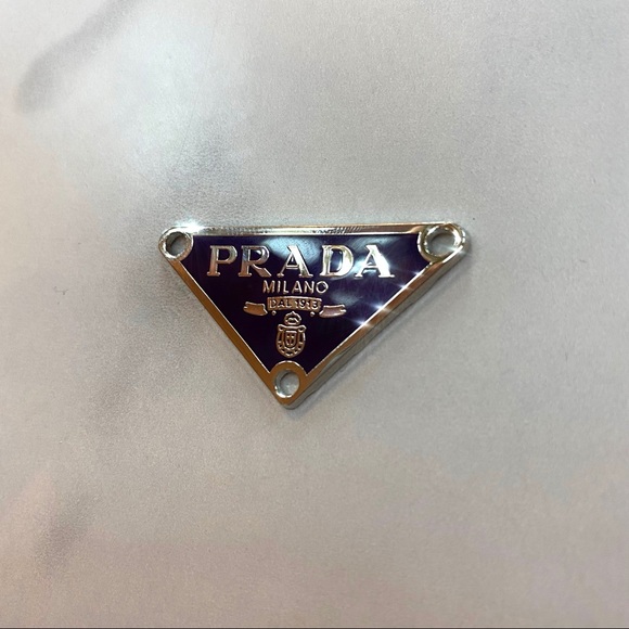 Prada Jewelry - Authentic Dark Purple & Silver Prada Badge